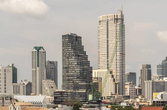 Bangkok, Thailand - 28 Sep, 2024 - Beautiful view of Skyscrapers Bangkok City at Afternoon. Stunning At skyline of bangkok business district, use it as your wallpaper, poster and Space for text, Selective focus.