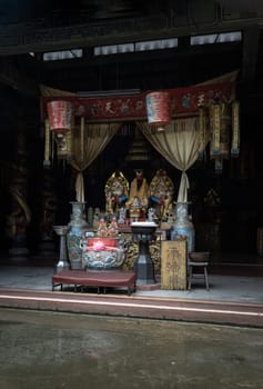Bangkok, Thailand - Apr 29, 2022 - Chinese god statues on Chinese altar table at Phutthamonthon sathan or Sun wukong shrine. Space for text, Selective focus.