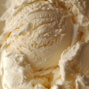 A bowl filled with creamy vanilla ice cream showcases its smooth texture and delightful swirls. This refreshing treat is perfect for hot summer days and sweet cravings.