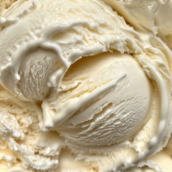 A perfectly scooped ball of creamy vanilla ice cream showcases its smooth texture, offering a delicious treat ideal for warm days spent indoors.