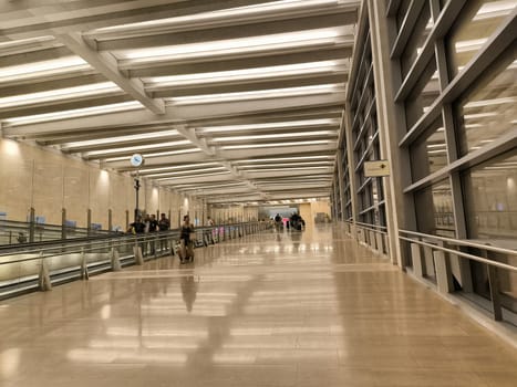 18 August 2024 Tel-Aviv Israel Ben Gurion airport Empty hallway inside Terminal 3 building, ceiling lamps floor interior modern design space place.Editorial photo