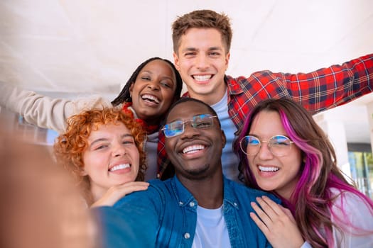 Group of students, meet on university campus work together on creative tasks, prepare for university exams, use laptop. Education, study of university life concept.