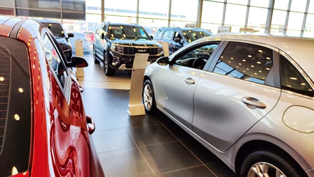 Kazan, Russia - April 04, 2023: Cars in showroom of dealership KIA. Re-export to Russia