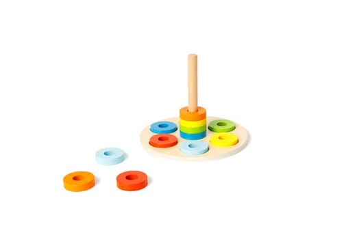Wooden education colorful puzzle toy isolated on white background.
