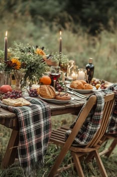 A very beautifully set table in nature, in a cozy autumn garden. High quality photo