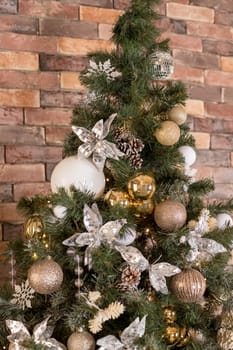 Christmas tree branches with decorations, balls, garlands, bokeh. Postcard with space for text.