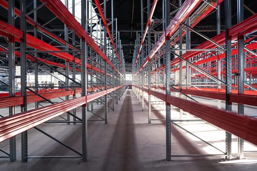 logistics warehouse concept with empty high pallet racks, shelving system