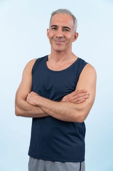 Active and fit physique senior man portrait with happy smile on isolated background. Healthy lifelong senior people with fitness healthy and sporty body care lifestyle concept. Clout