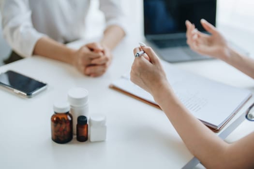 A doctor psychologist is giving counseling to a depressed patient.