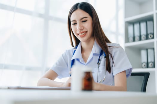 The doctor is checking the patient's history before giving treatment.