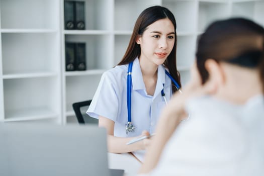 A doctor psychologist is giving counseling to a depressed patient.