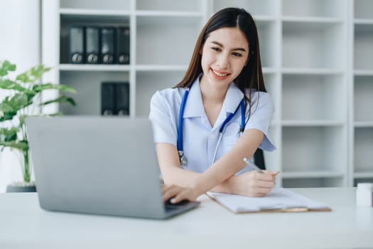 The doctor is checking the patient's history before giving treatment.