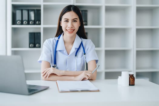 The doctor is checking the patient's history before giving treatment.