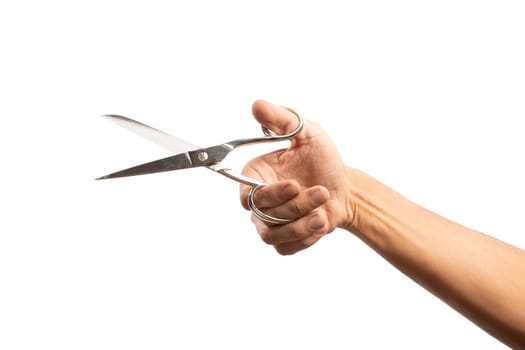 Black male hand holding scissors isolated