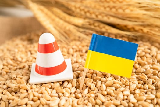 Grains wheat with Ukraine flag, trade export and economy concept.