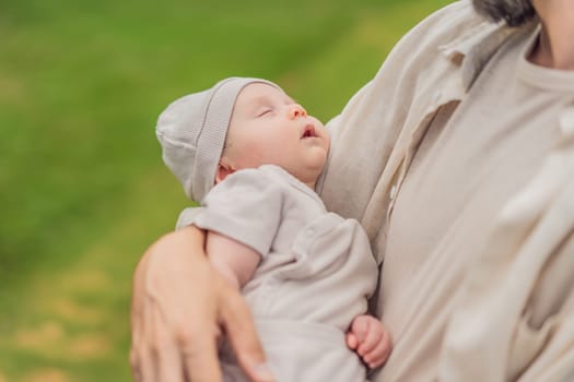 A happy 40-year-old father cradles her newborn in a sun-drenched park. Love, family and generations in harmony.