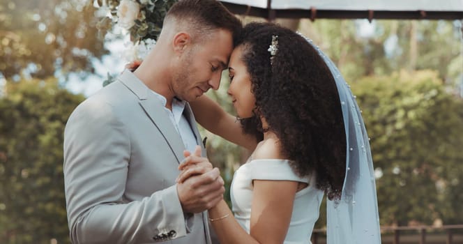 Couple, wedding and dancing with touch, countryside and commitment in celebration, love and smile. Interracial marriage, fashion and happy in outdoor, peace and romance of union and trust.