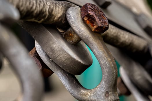 Detail of Open Swage Socket also are used as an end termination on overhead crane hoist lines. U-shaped piece of equipment, a metal shackle is generally used as a connecting link in a variety of rigging, lifting, pulling and hoisting applications, Connections concept and securing, Copy space, Selective Focus.