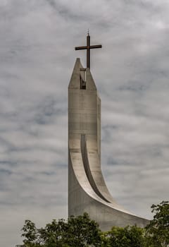 Bangkok, Thailand - 16 Sep, 2024 - Minimalist modern style of The Blessed Sacrament Church with sky background. Architecture exterior design of Roman Catholic Church in Taling Chan, Space for text, Selective focus.