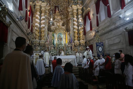 salvador, bahia, brazil - january 1, 2022: Devotees during mass at Conceicao da Praia church in Salvador city.