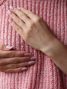 Pink October Breast Cancer Awareness month, woman hand with pink Ribbon in hospital for support people life and illness. Vertical