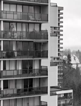 High rise buildings on foggy winter morning in a city. Vancouver, Canada.