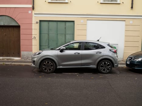 Cremona, Italy September 26th 2024 A brand new metallic grey ford puma parked on the side of a street in an italian neighborhood