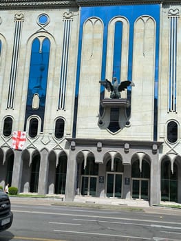 18 August 2024 Tbilisi Georgia modern building in the city center, flag. High quality photo