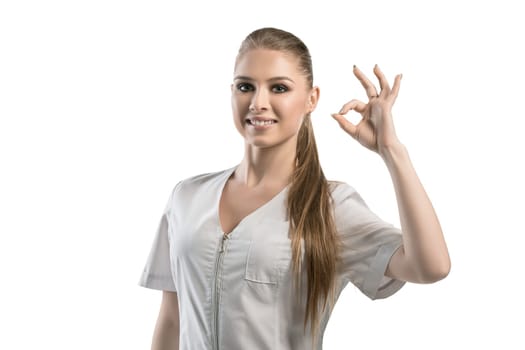 Beautiful nurse in white uniform isolated cropped portrait on white background