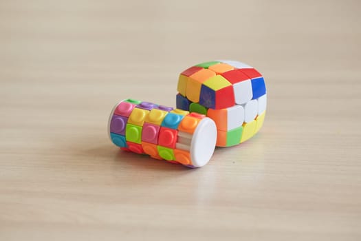Plastic children's erudition game on a table with a blurred background, Learning. Children's leisure time.