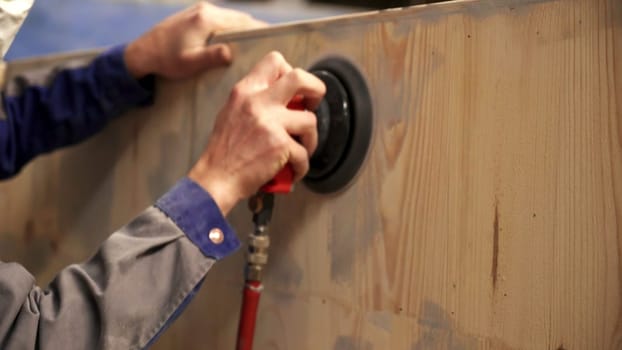 The image shows a close up of a crafted wood panel, highlighting its unique texture and rich grains. Stock Clip