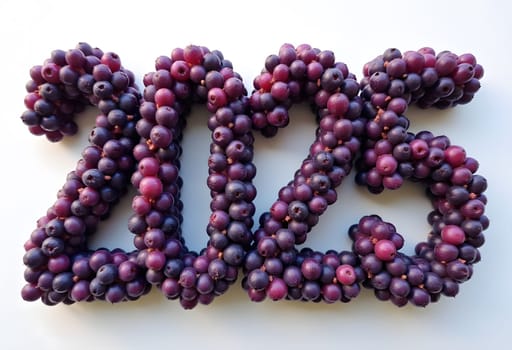 Bold numbers 2025 crafted from rich, dark blackcurrants, adding a fresh and fruity twist to new year celebrations