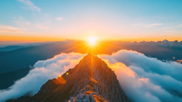 The sun is setting behind a mountain peak, casting warm light over the clouds