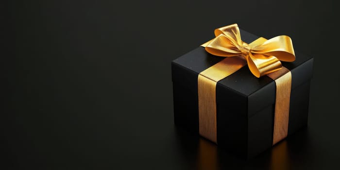 A captivating black gift box adorned with a shiny golden ribbon rests on a dark table, suggesting anticipation for an upcoming celebration or event.