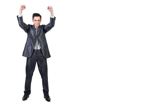 Full body of positive male in formal suit raising clenched fists and looking at camera while celebrating victory isolated on white background in studio