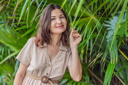 Portrait of a woman over 40, in the park.