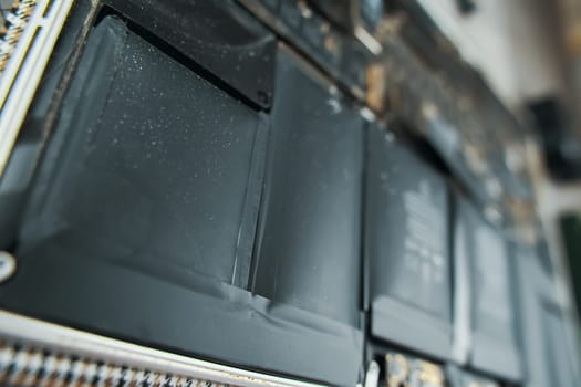 Detailed view of lithium-ion batteries inside an electronic device, showcasing technology and design.