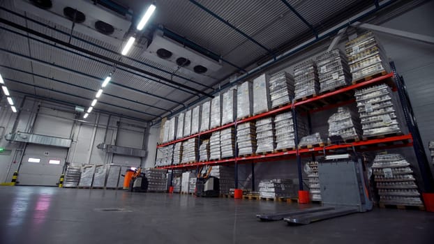 Moscow - Russia, 04.20.2022: View inside of commercial warehouse with packed goods. Creative. New modern storage house