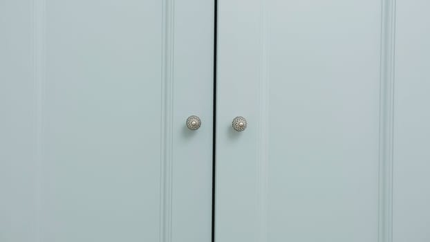 Beautiful white wardrobe. Creative . A room in which a boy hangs his clothes in a large white closet. High quality 4k footage