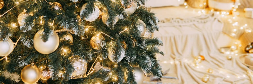 Christmas balls in close-up on the Christmas tree. Decorations for Christmas trees. The concept of celebrating New Year and Christmas