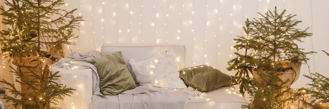 Interior bedrooms in Scandinavian style, decorated for the Christmas holidays. Live ate in the interior