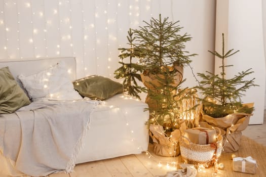 Interior bedrooms in Scandinavian style, decorated for the Christmas holidays. Live ate in the interior