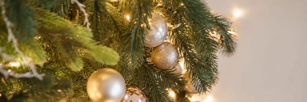 Christmas balls in close-up on the Christmas tree. Decorations for Christmas trees. The concept of celebrating New Year and Christmas