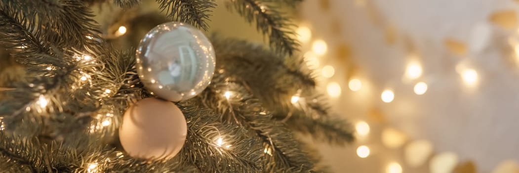 Christmas balls in close-up on the Christmas tree. Decorations for Christmas trees. The concept of celebrating New Year and Christmas
