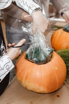 Creating a floral composition in a pumpkin. Making decor with your own hands