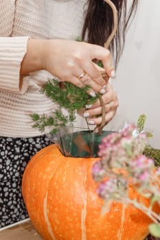 Creating a floral composition in a pumpkin. Making decor with your own hands