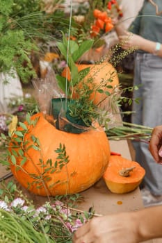 Creating a floral composition in a pumpkin. Making decor with your own hands
