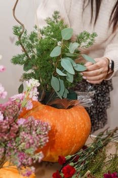 Creating a floral composition in a pumpkin. Making decor with your own hands