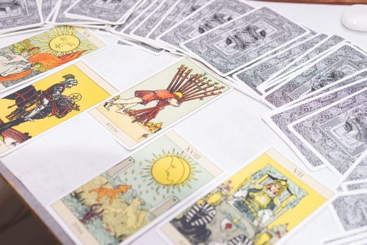 TVER, RUSSIA - FEBRUARY 18, 2024. Tarot cards, Tarot card divination, fortune telling. Occultism, esoteric education