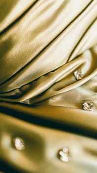 Flowing green and orange fabric with soft texture, shiny material, elegant touch, perfect for fashion or decor projects. Captures dynamic motion, smooth design
